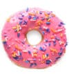 Colorful sprinkled donut with pink icing.