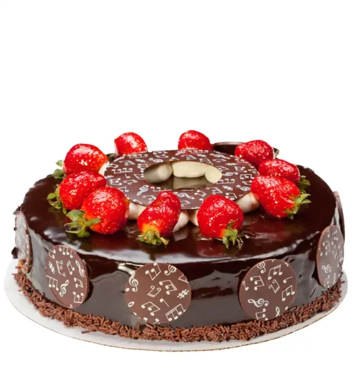 Delicious chocolate cake topped with fresh strawberries for bakery market place.