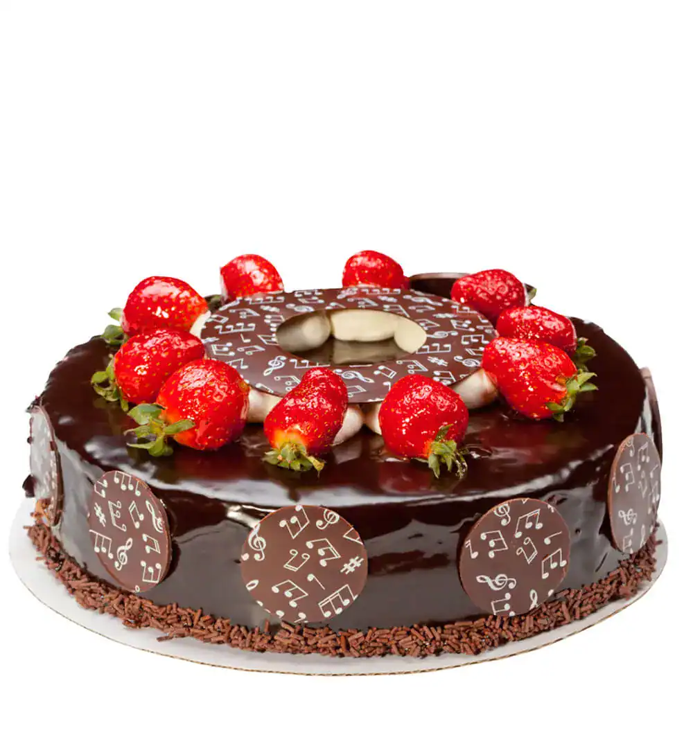 Delicious chocolate cake topped with fresh strawberries for bakery market place.