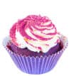 Cupcake with pink sprinkles and whipped cream topping.