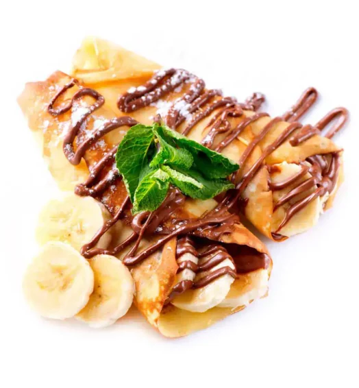 Delicious banana and chocolate crepe with fresh fruit and mint garnish.